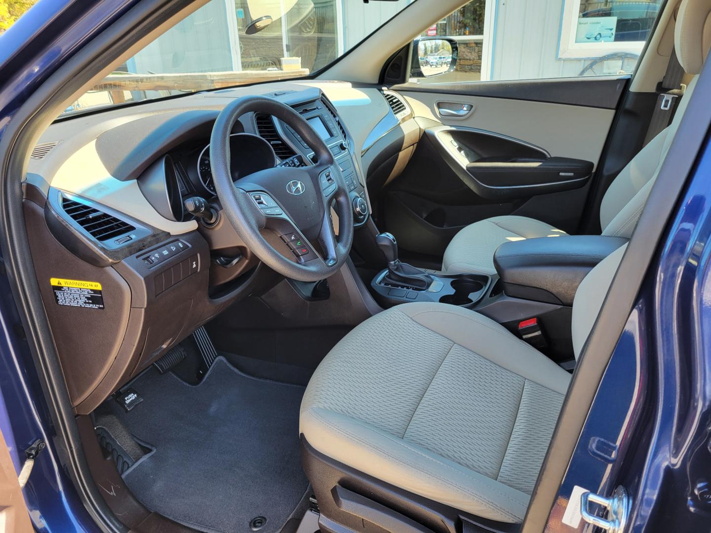 2018 Blue /Tan Hyundai Santa Fe Sport (5XYZTDLB0JG) with an 2.4L L4 engine, 6 Speed Auto transmission, located at 450 N Russell, Missoula, MT, 59801, (406) 543-6600, 46.874496, -114.017433 - Photo#11